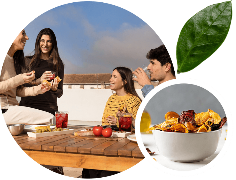 People enjoying a meal together on a rooftop with a close-up of a bowl of food.